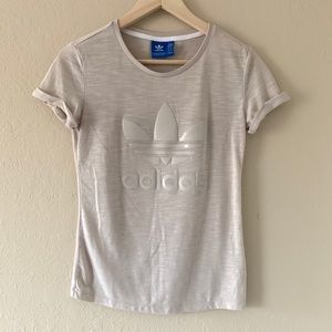 nude adidas graphic tee